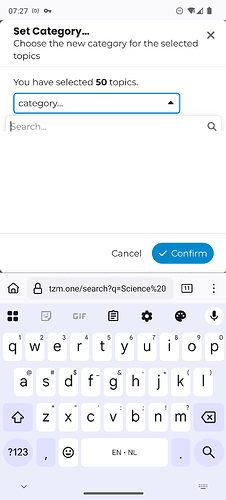 The image shows a dialogue box prompting the user to set a new category for 50 selected topics on a mobile device, with the title 'Set Category...' and options to cancel or confirm the action. (Captioned by AI)
