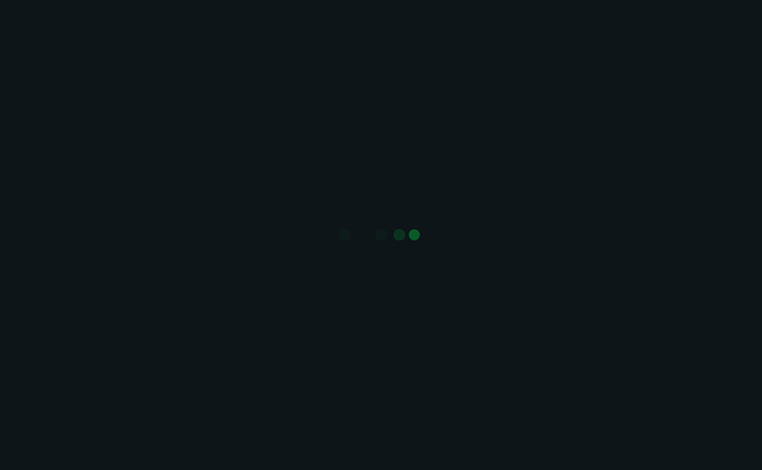 L'image affiche un fond sombre avec une ligne verticale de quatre petits points verts. (Légendé par l'IA)